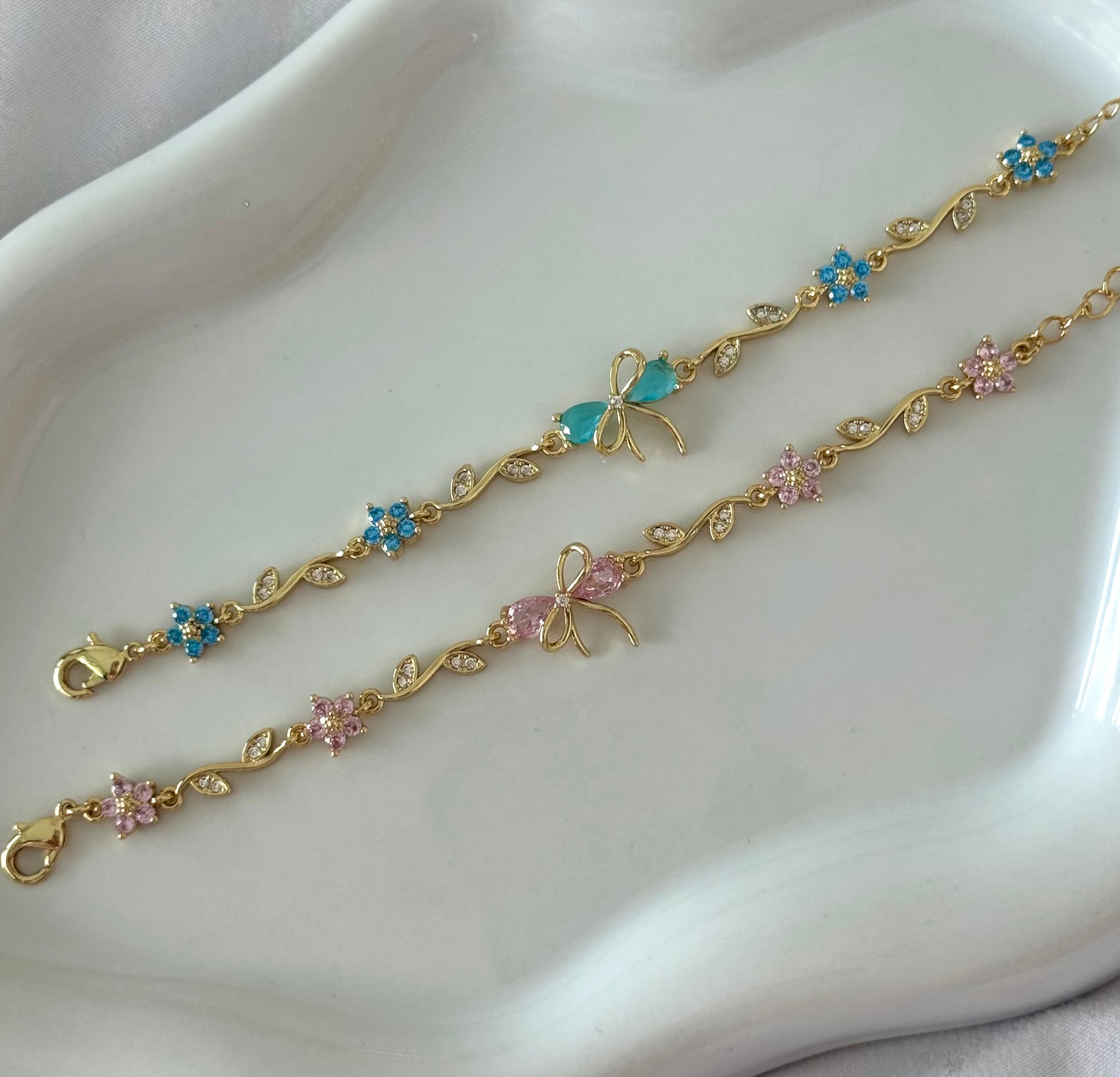Floral bow charm bracelet