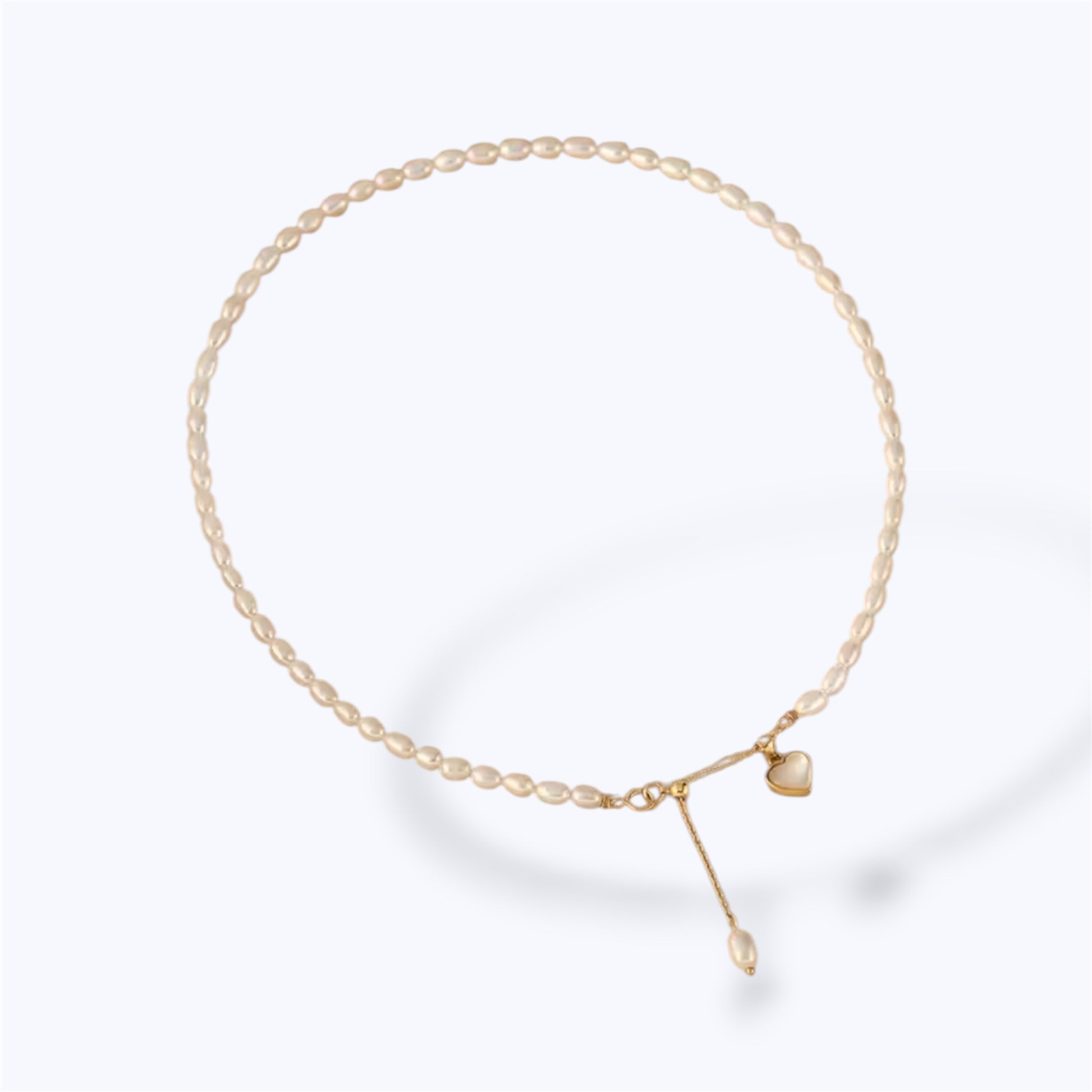 Adjustable pearl heart necklace