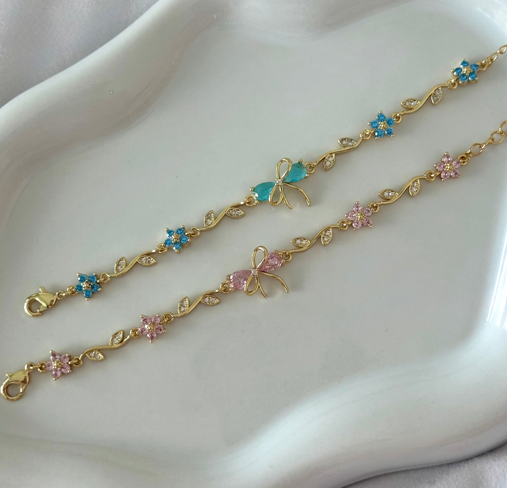 Floral bow charm bracelet