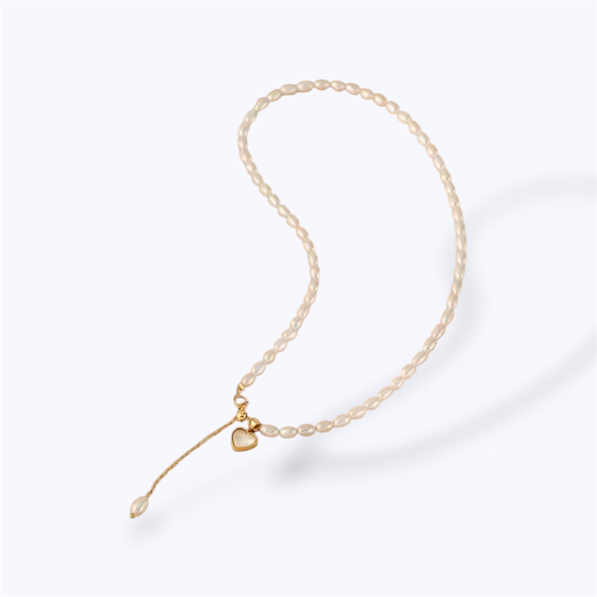 Adjustable pearl heart necklace